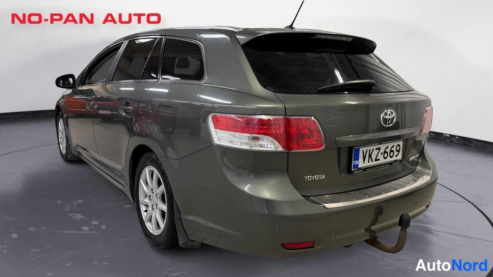 Vihreä Toyota Avensis 2010, takaviisto, kuva 6