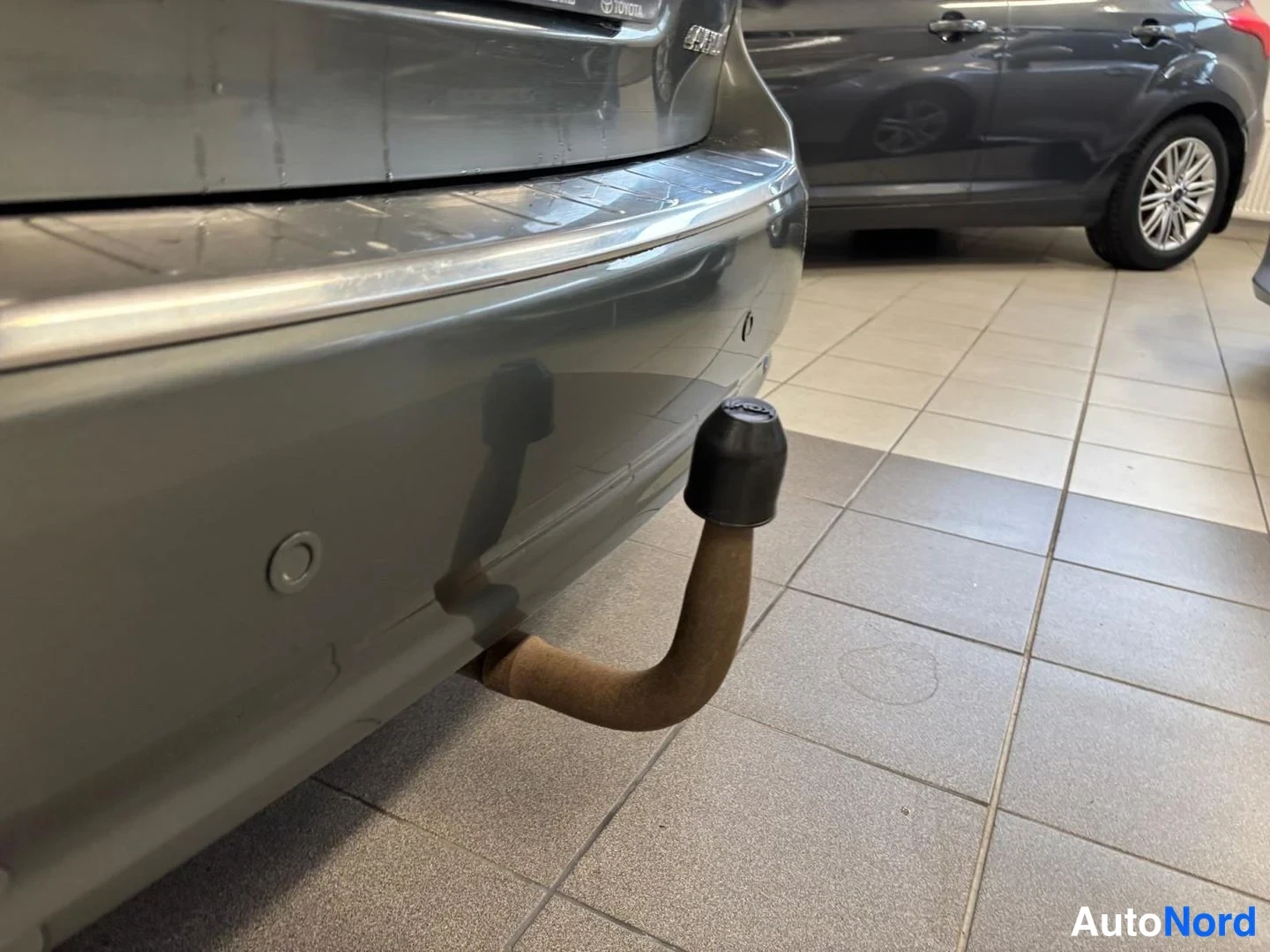 Vihreä Toyota Avensis 2010, takaa, kuva 10