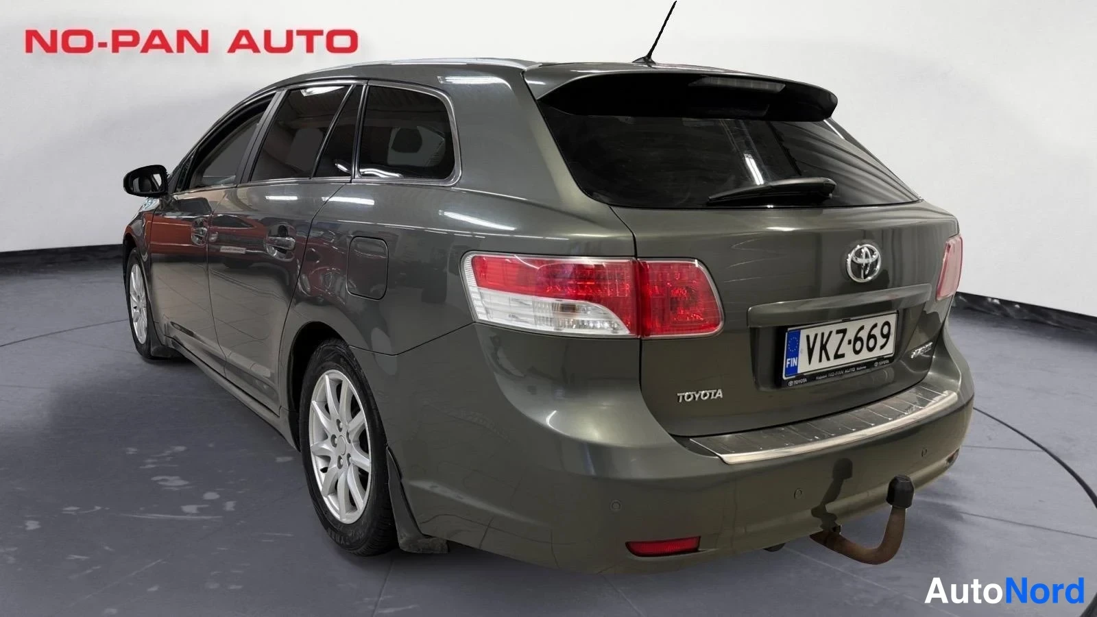 Vihreä Toyota Avensis 2010, takaviisto, kuva 7