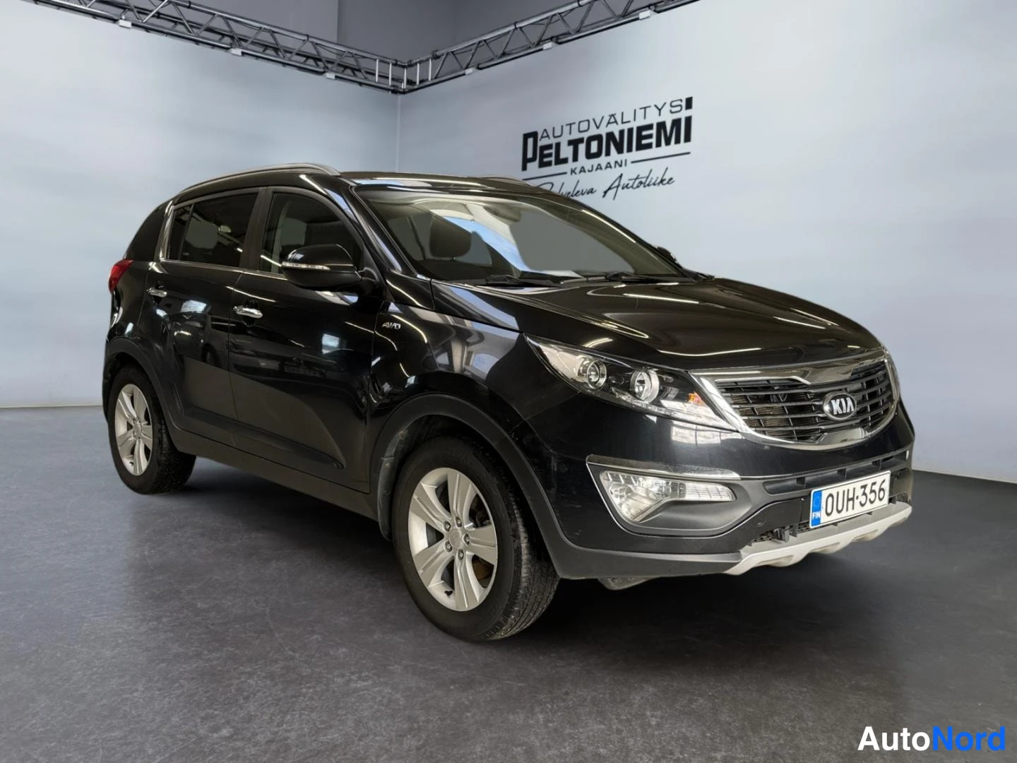 Musta Kia Sportage 2014, etuviisto, keula oikealle, kuva 2