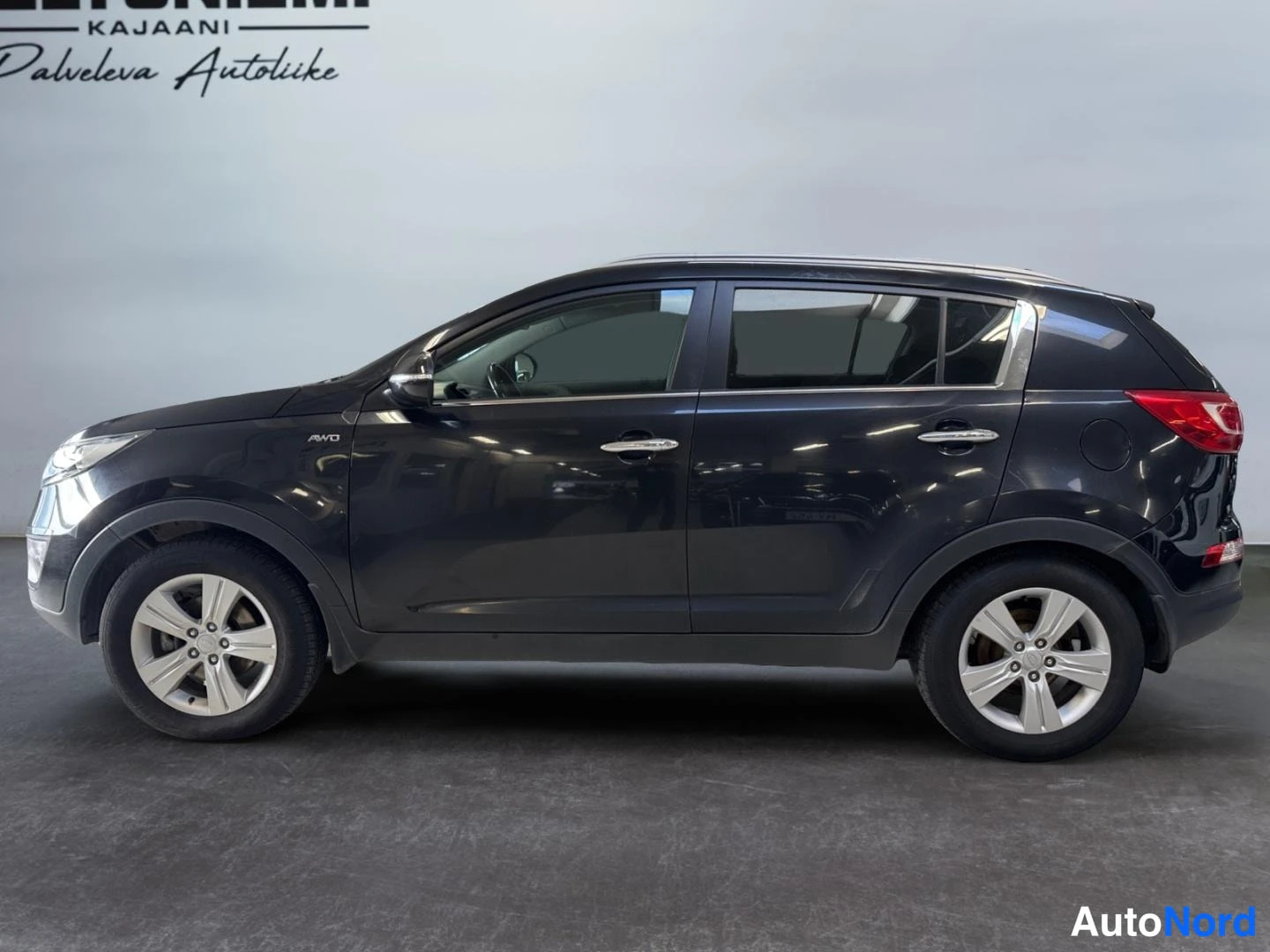 Musta Kia Sportage 2014, sivulta, kuva 4