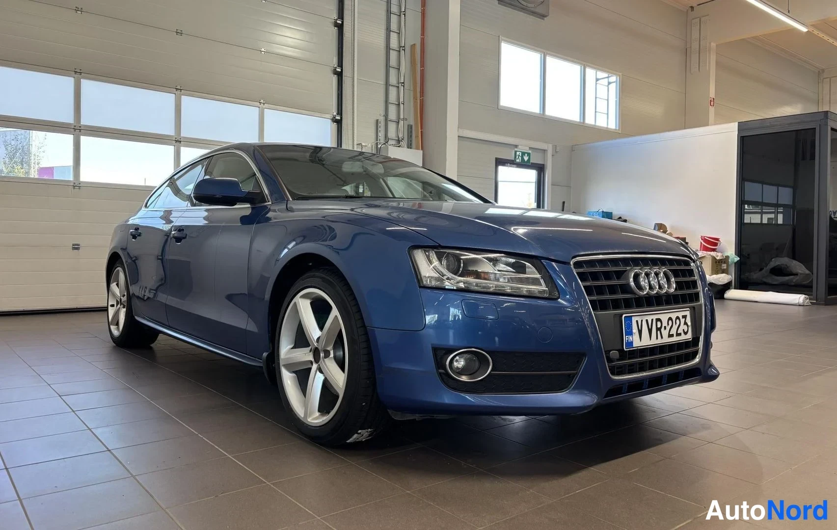 Sininen Audi A5 Sportback 2011, etuviisto, keula oikealle, kuva 3