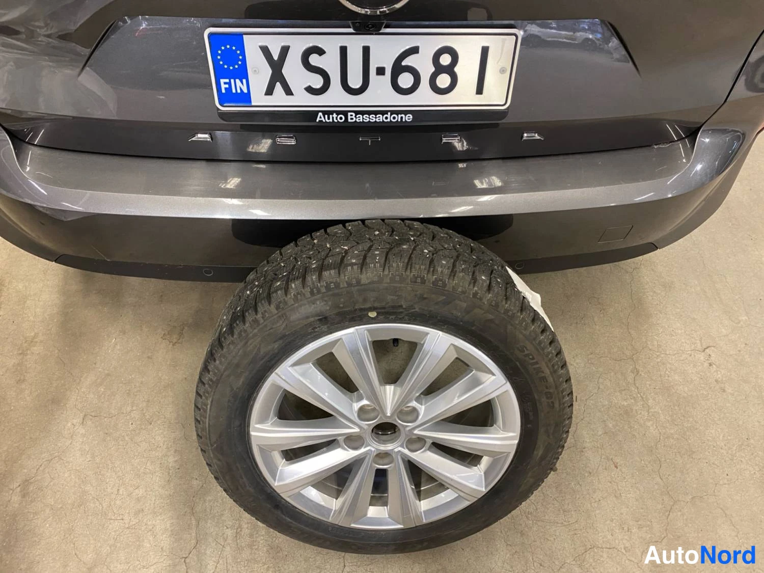 Harmaa Opel Astra Sports Tourer 2024, takaa, kuva 9