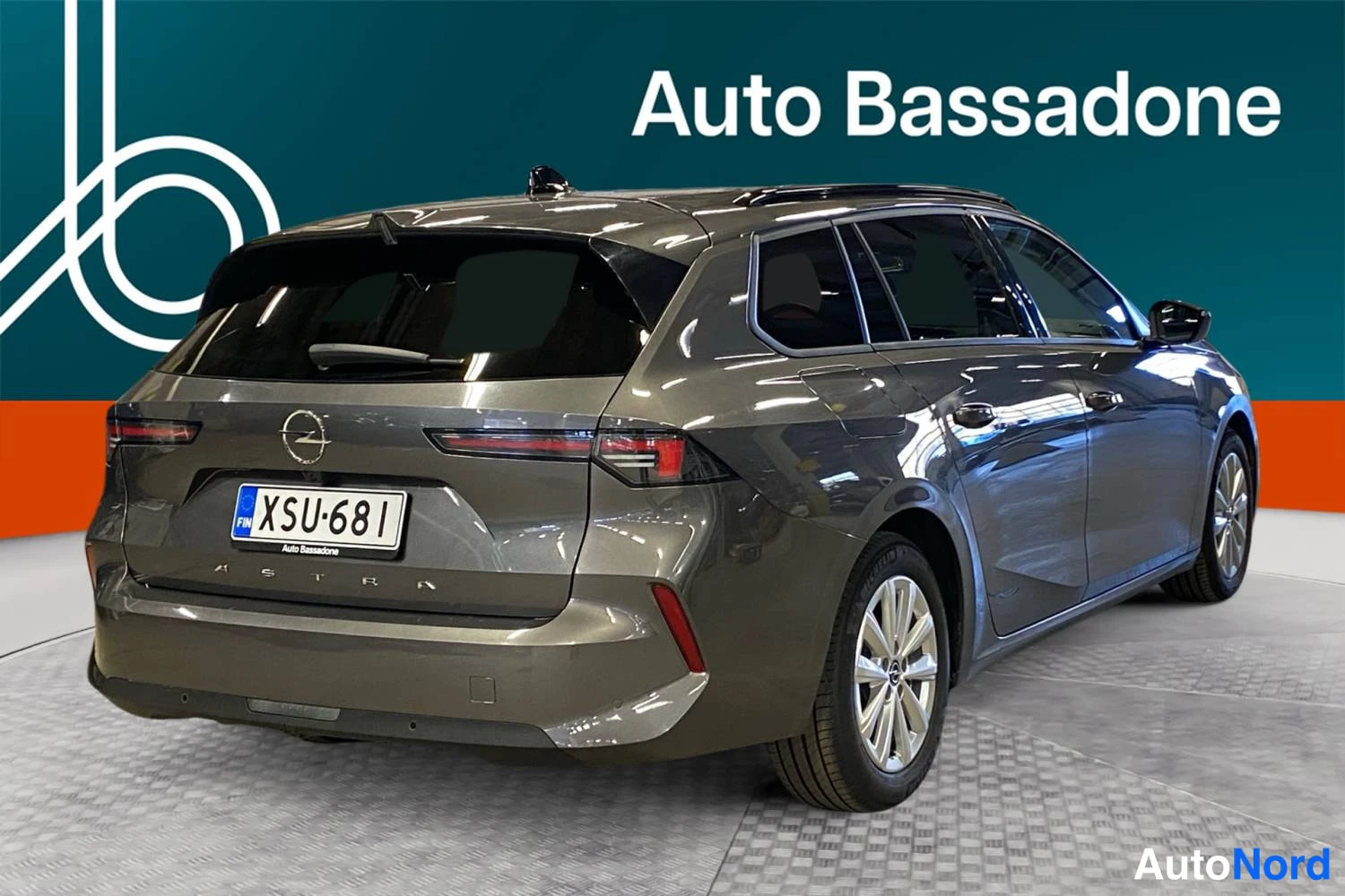 Harmaa Opel Astra Sports Tourer 2024, takaviisto, kuva 7