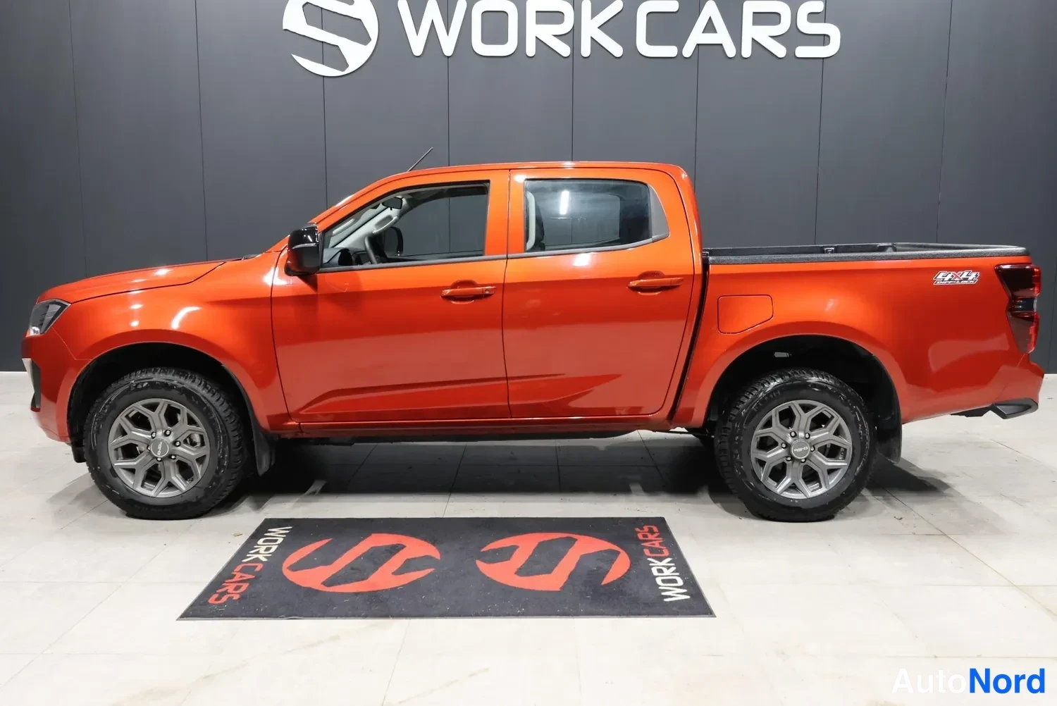 Oranssi Isuzu D-Max 2026, sivulta, kuva 6