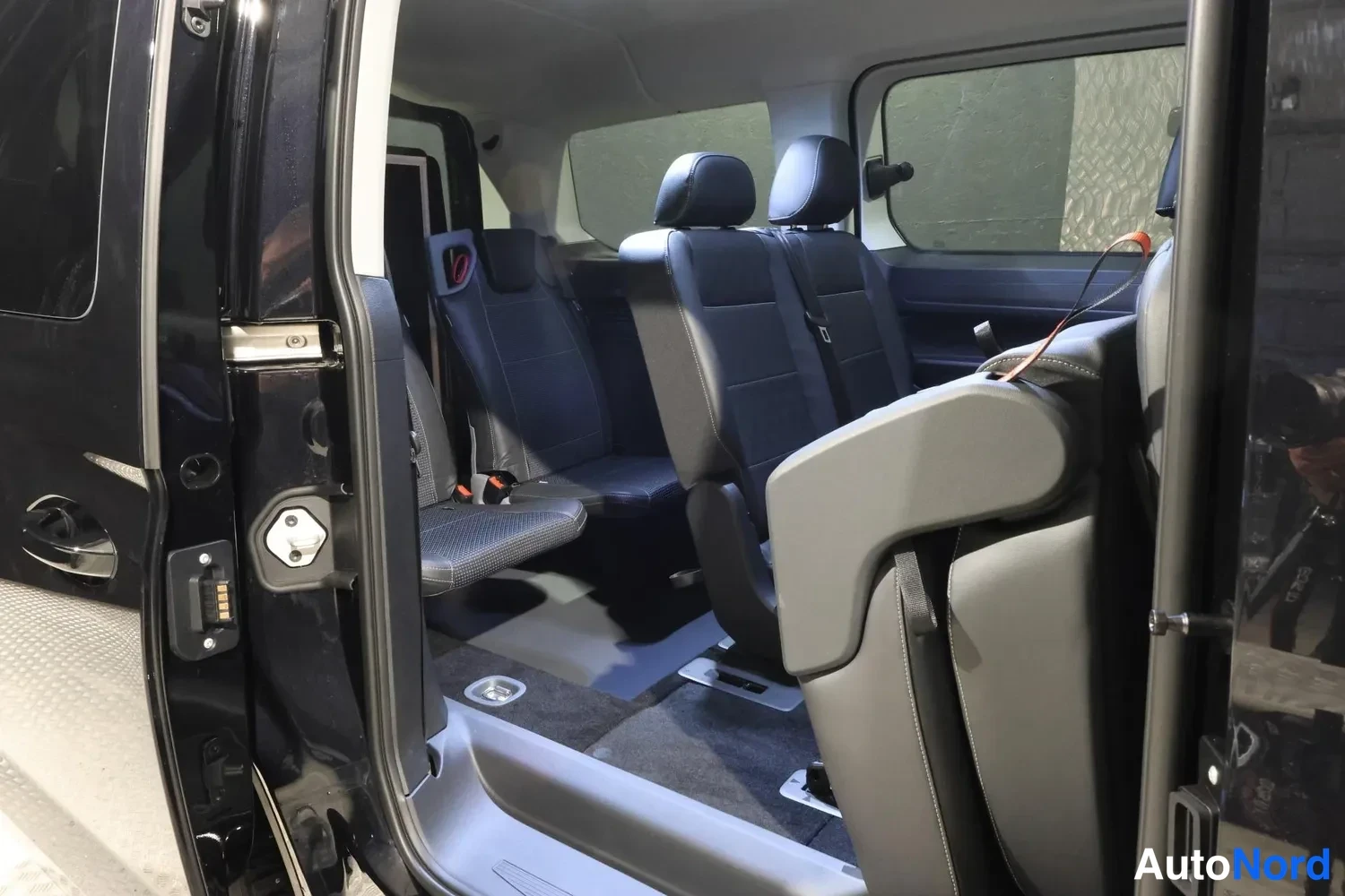 Black Volkswagen Caddy Maxi Grand Tourneo Connect 2026, rear seats, photo 18