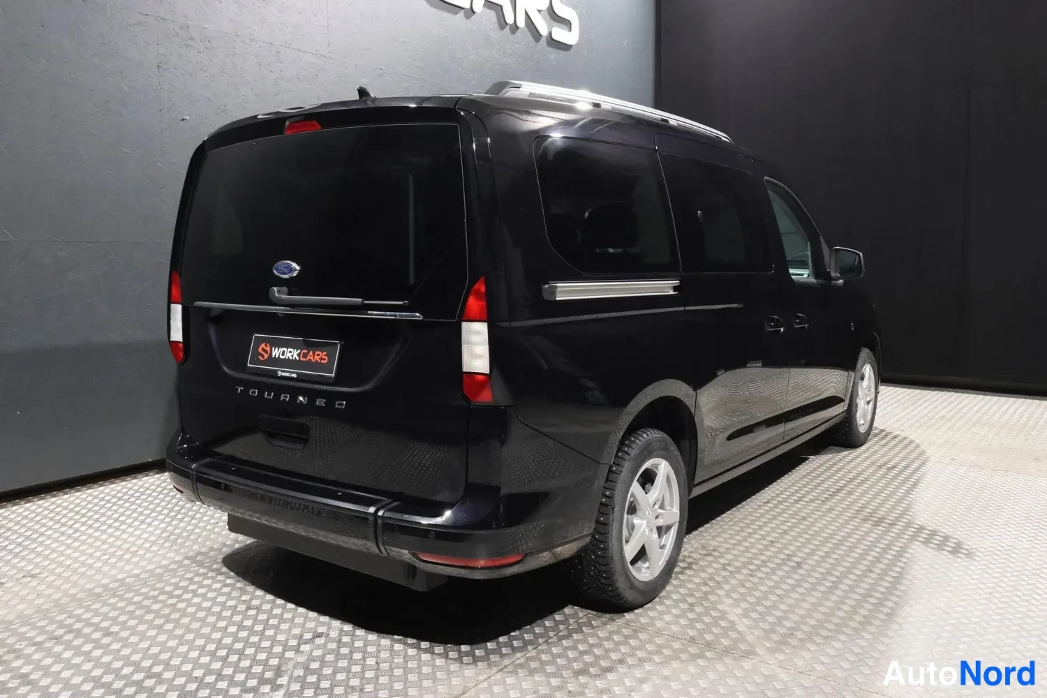 Black Volkswagen Caddy Maxi Grand Tourneo Connect 2026, rear three-quarter, photo 9