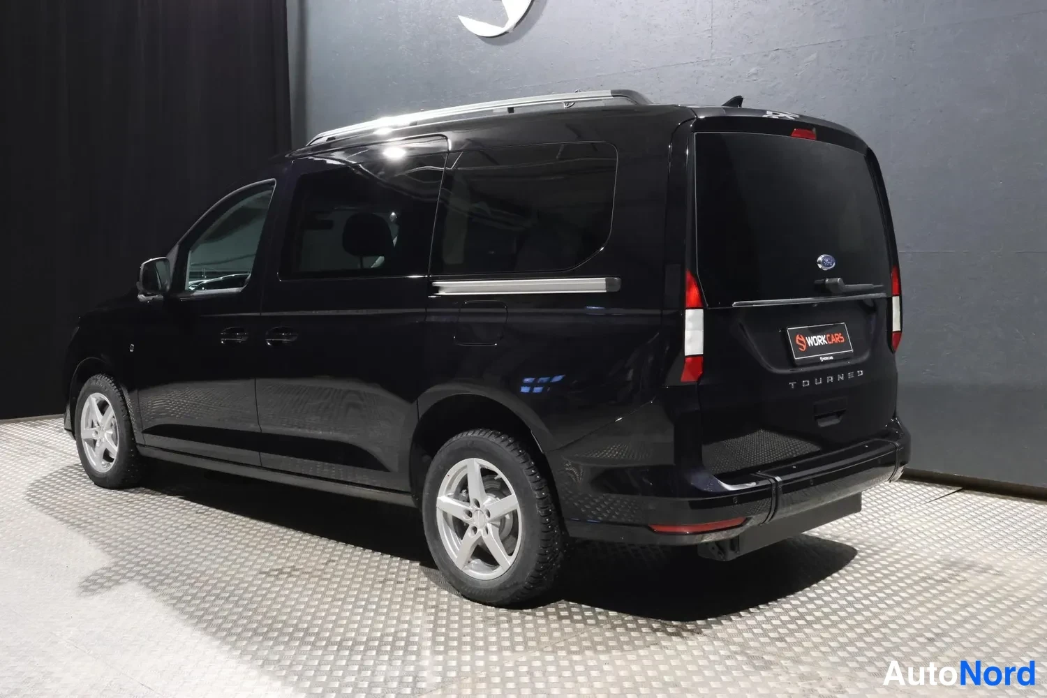 Black Volkswagen Caddy Maxi Grand Tourneo Connect 2026, rear three-quarter, photo 10