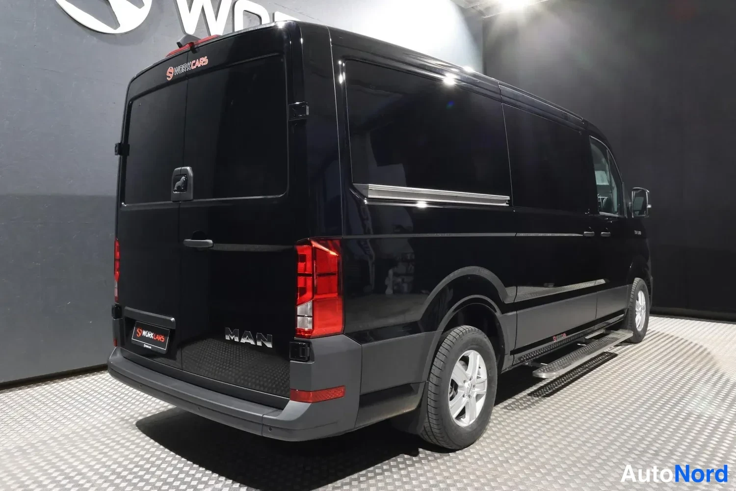 Black MAN TGE 2026, rear three-quarter, photo 9