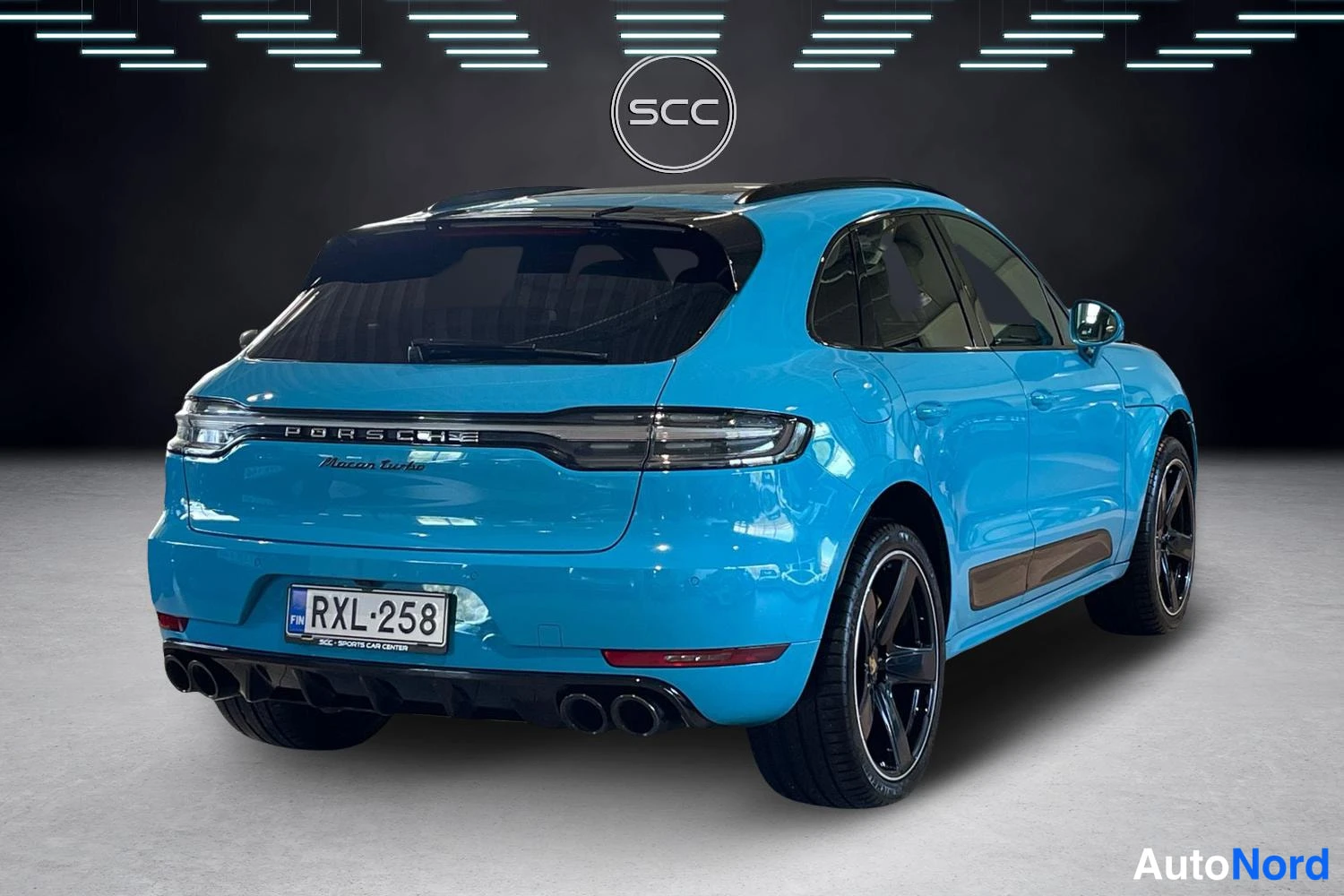 Sininen Porsche Macan 2020, takaviisto, kuva 4