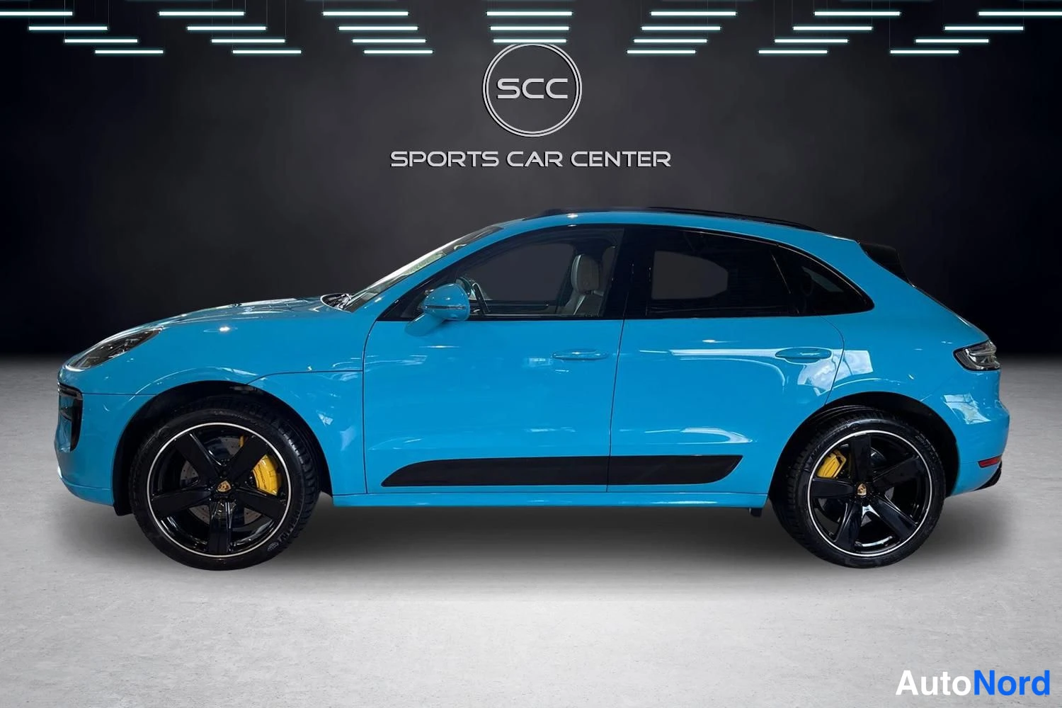 Sininen Porsche Macan 2020, sivulta, kuva 3