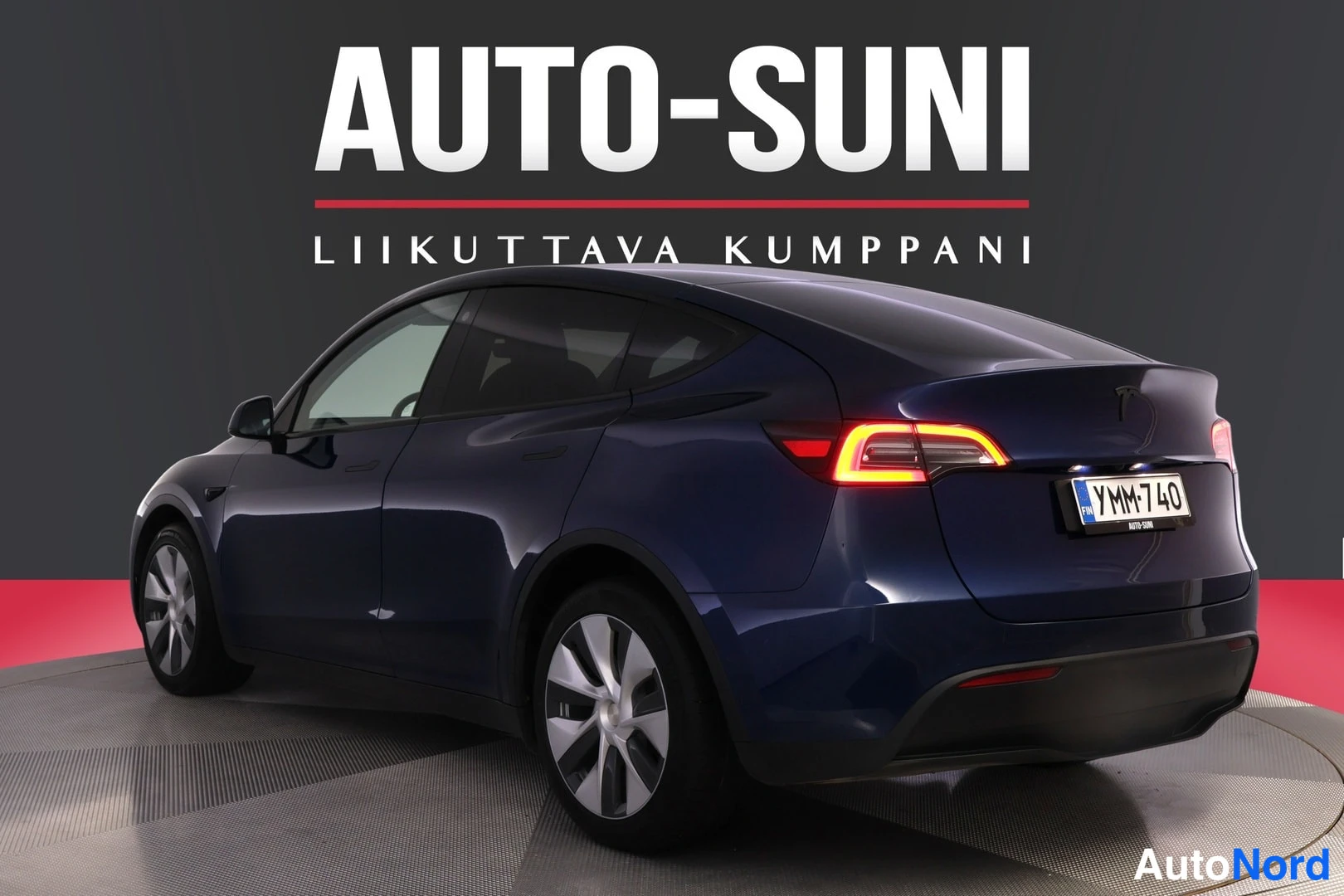 Sininen Tesla Model Y 2021, takaviisto, kuva 6