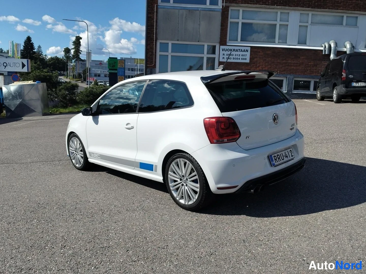 Valkoinen Volkswagen Polo 2013, takaviisto, kuva 5