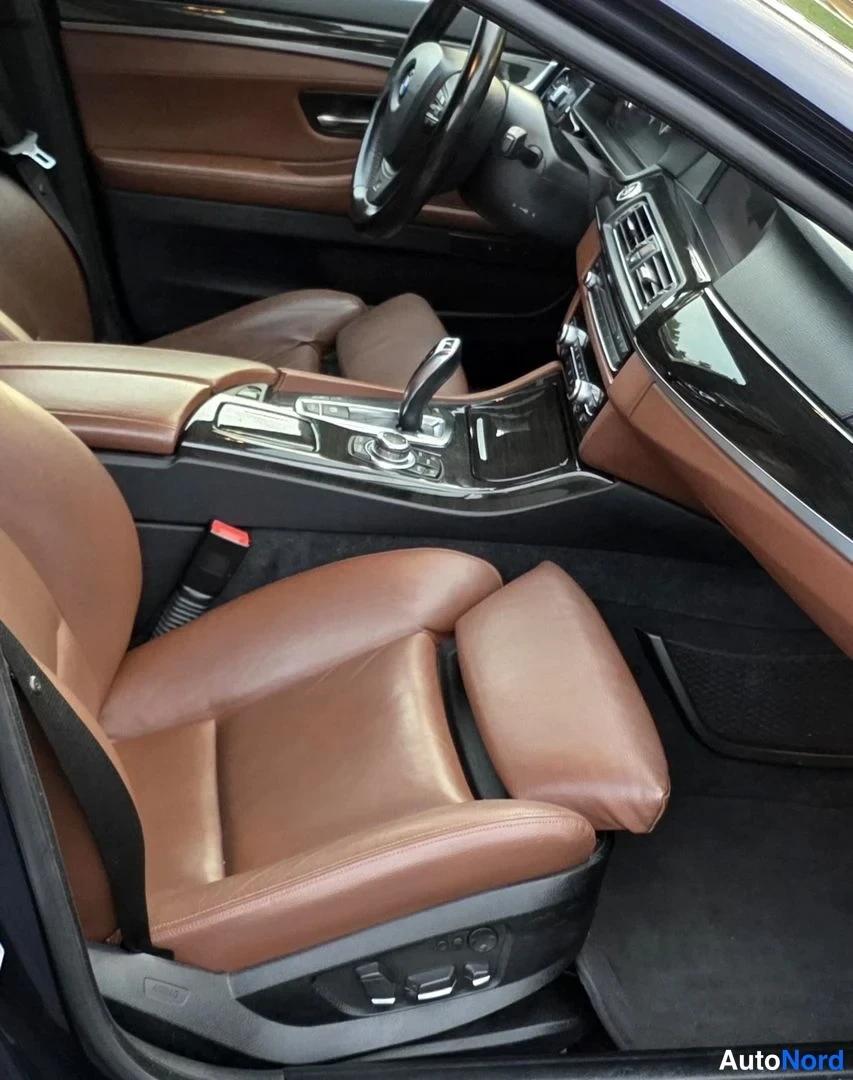 Sininen BMW 525d 2011, etuistuimet, kuva 24