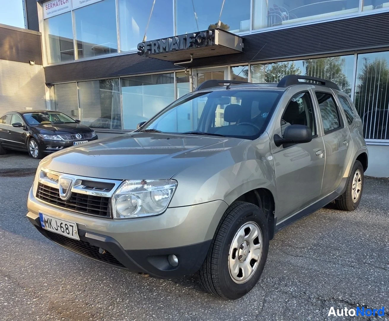Beige Dacia Duster 2010, etuviisto, keula vasemmalle, kuva 3