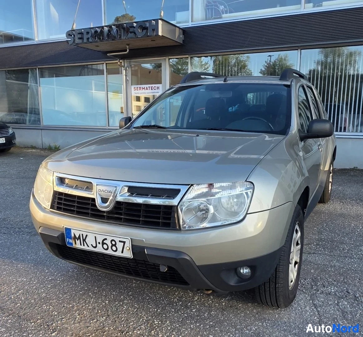 Beige Dacia Duster 2010, etuviisto, keula vasemmalle, kuva 4