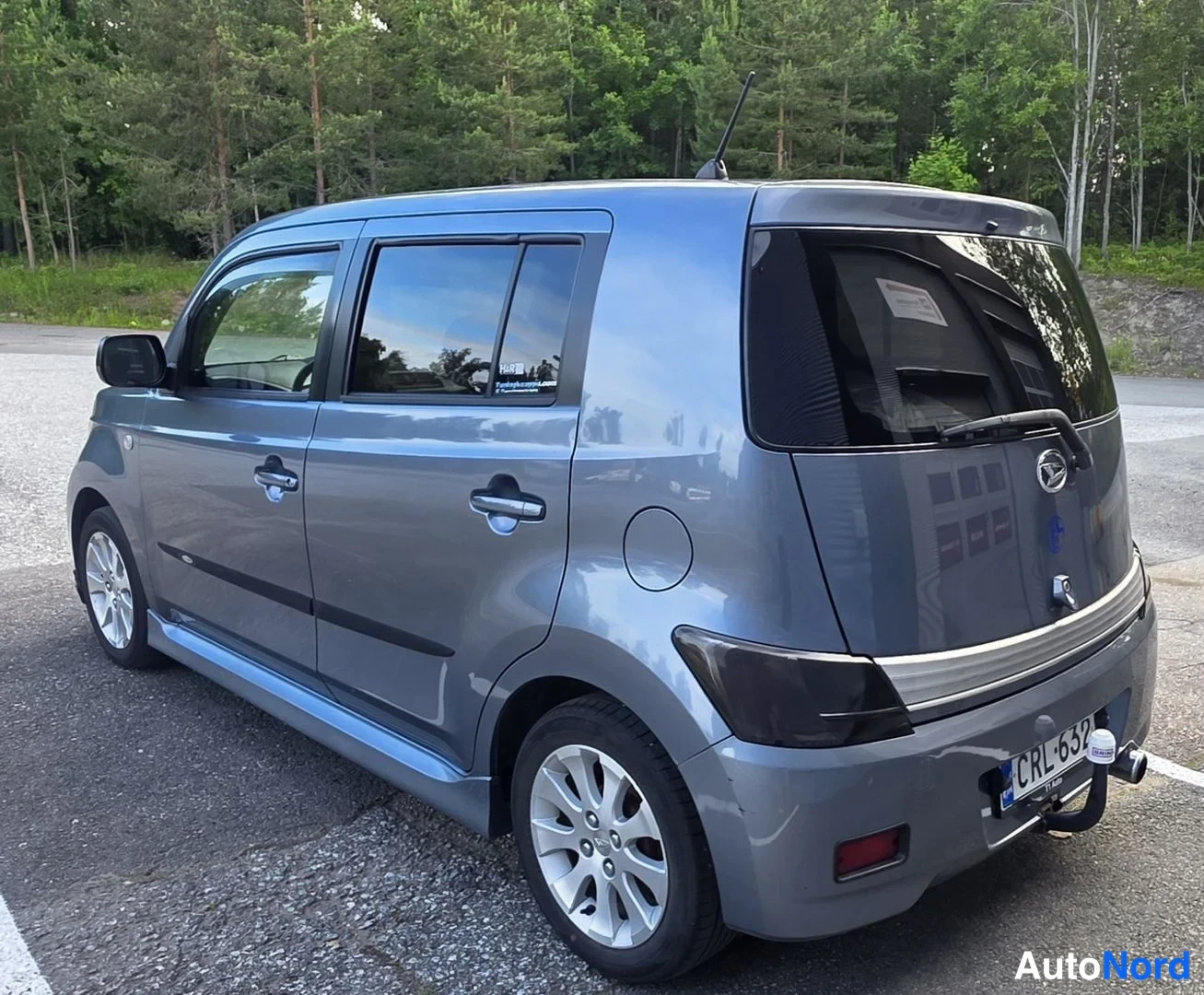 Harmaa Daihatsu Materia 2008, takaviisto, kuva 16