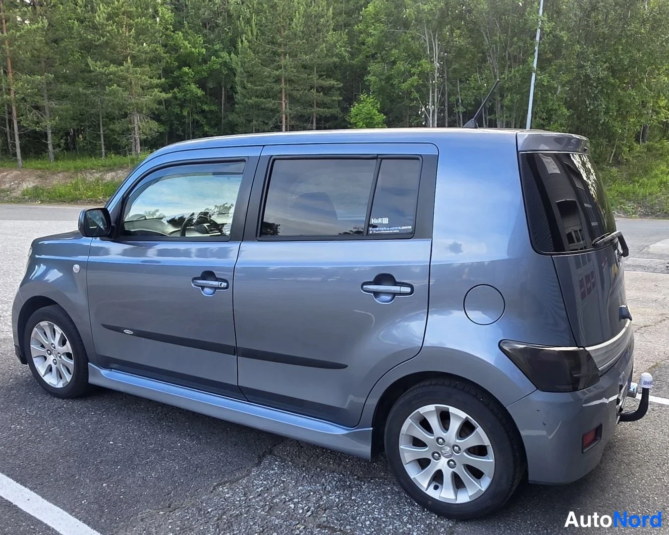 Harmaa Daihatsu Materia 2008, takaviisto, kuva 17