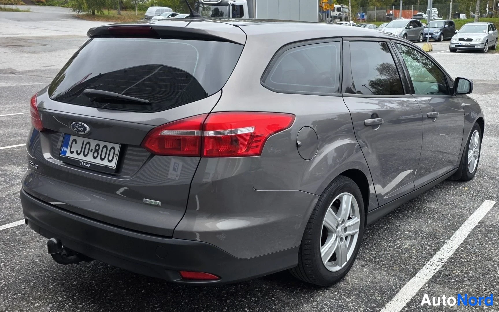 Harmaa Ford Focus 2015, takaviisto, kuva 17
