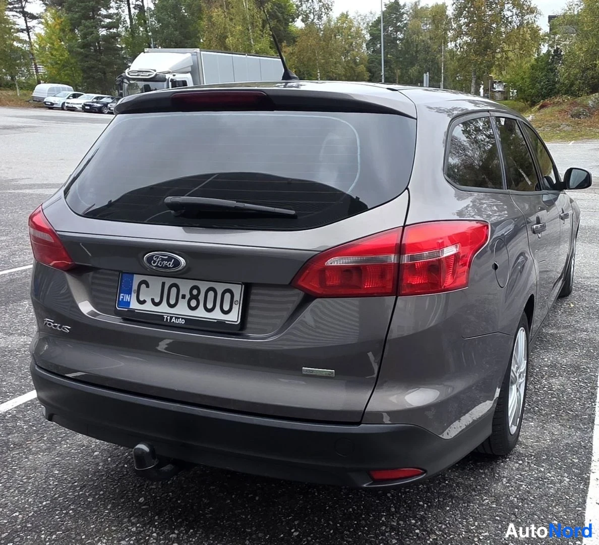 Harmaa Ford Focus 2015, takaviisto, kuva 18