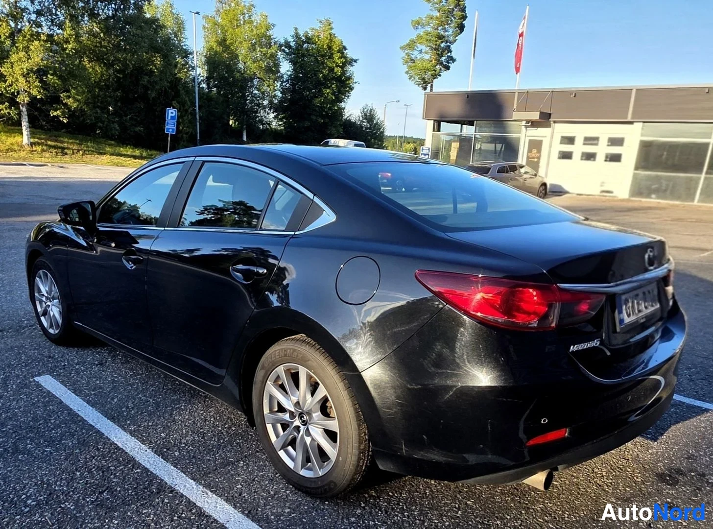 Musta Mazda 6 2014, takaviisto, kuva 15
