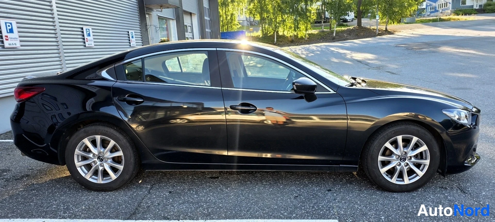 Musta Mazda 6 2014, sivulta, kuva 11