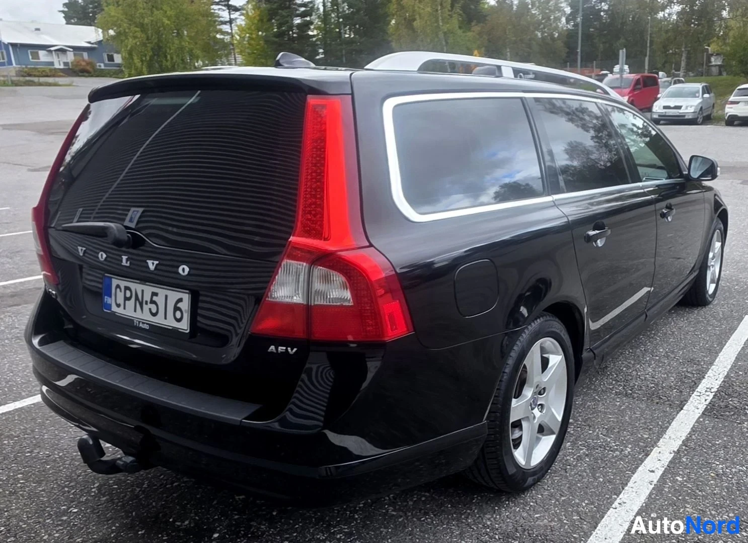 Musta Volvo V70 2011, takaviisto, kuva 17