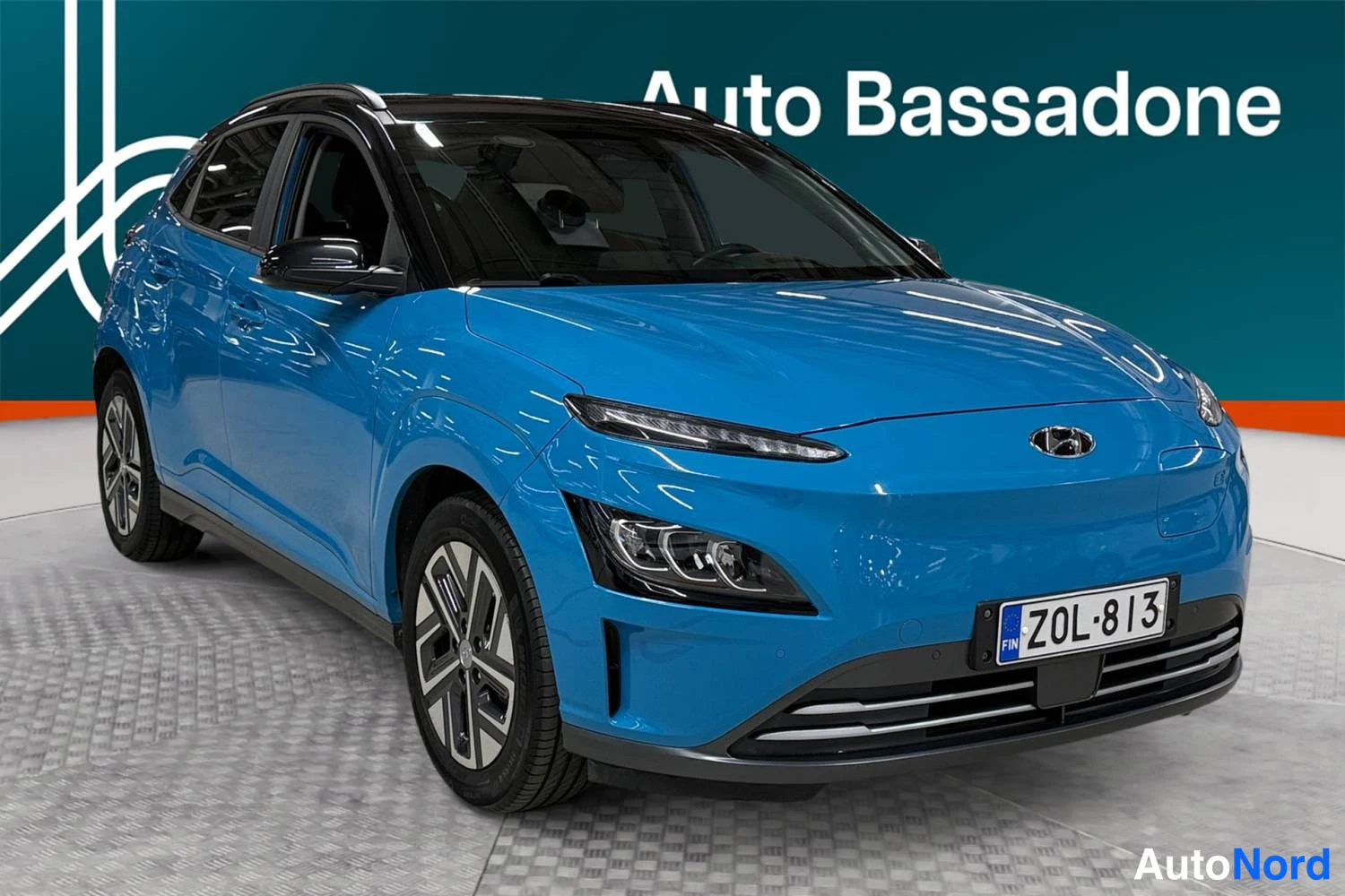 Sininen Hyundai Kona electric 2022, etuviisto, keula oikealle, kuva 2