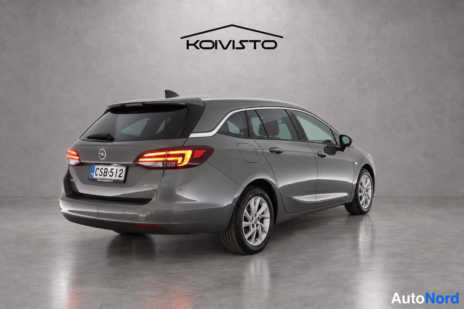 Harmaa Opel Astra 2017, takaviisto, kuva 4
