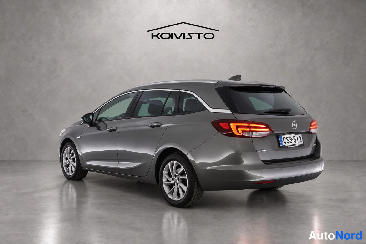Harmaa Opel Astra 2017, takaviisto, kuva 5