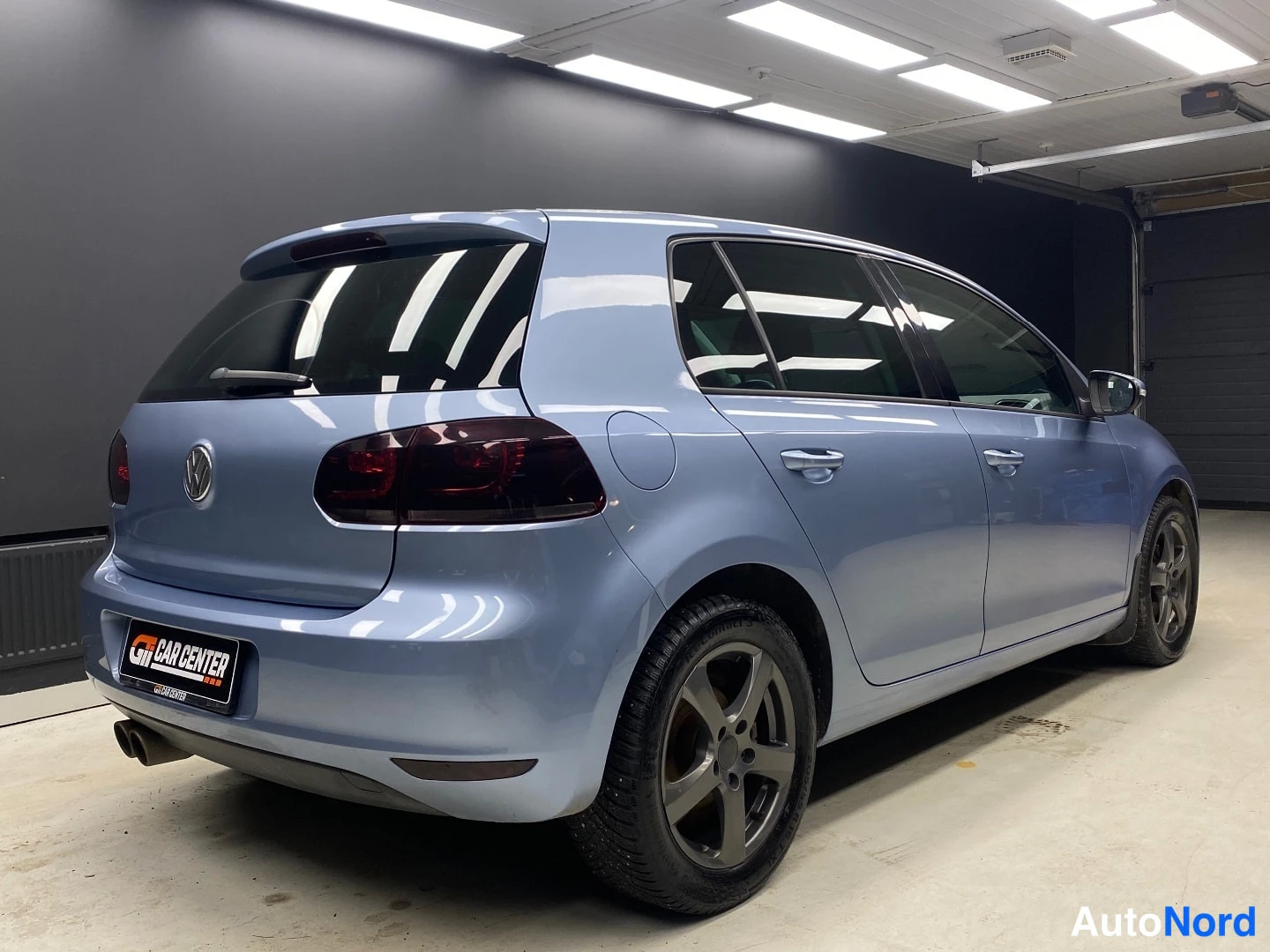 Sininen Volkswagen Golf 2011, takaviisto, kuva 5