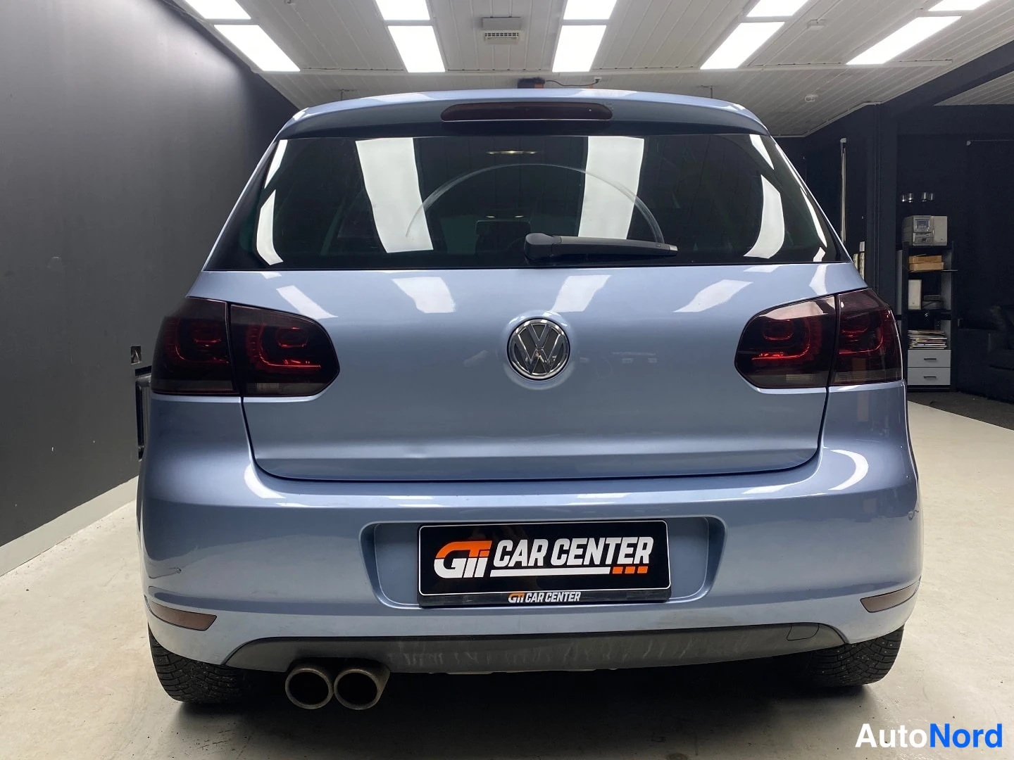 Sininen Volkswagen Golf 2011, takaa, kuva 6