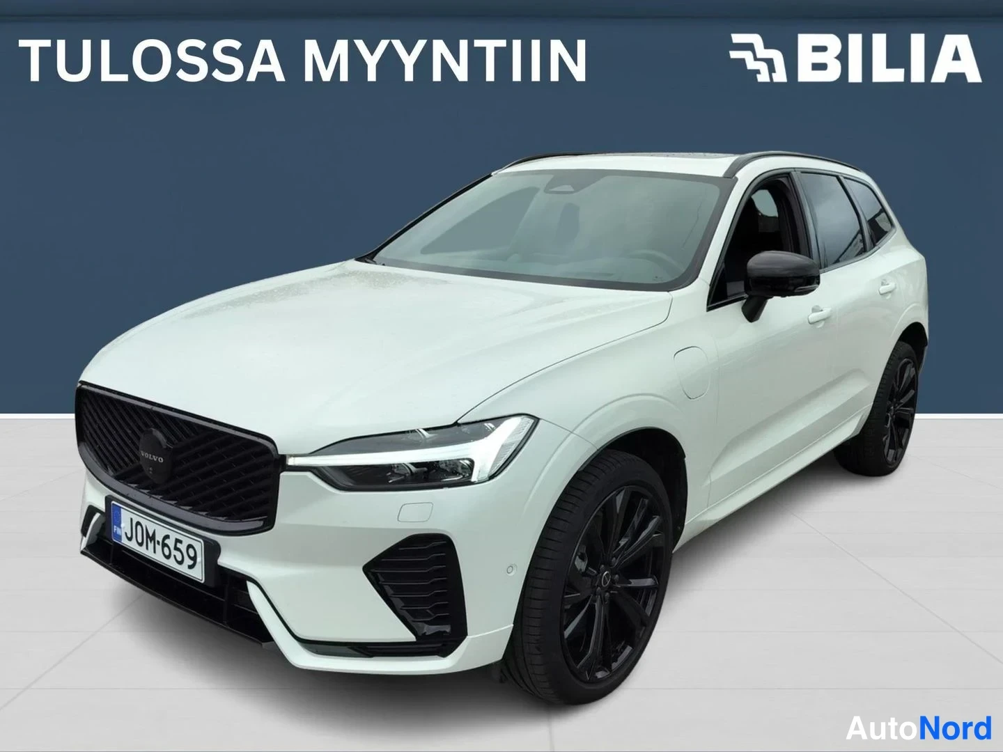 Valkoinen Volvo XC60 2026, etuviisto, keula vasemmalle, kuva 2