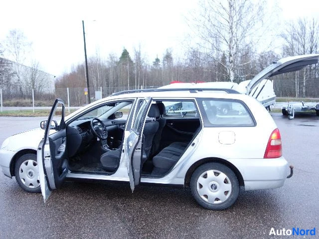 Hopea Toyota COROLLA 2003, etuviisto, keula vasemmalle, kuva 3