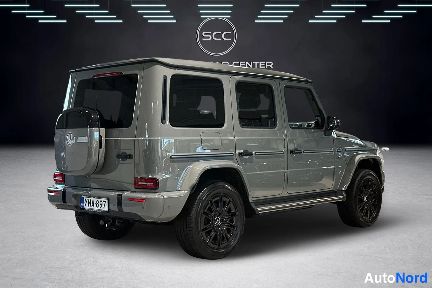 Silver Mercedes-Benz G 580 4MATIC 2025, rear three-quarter, photo 4
