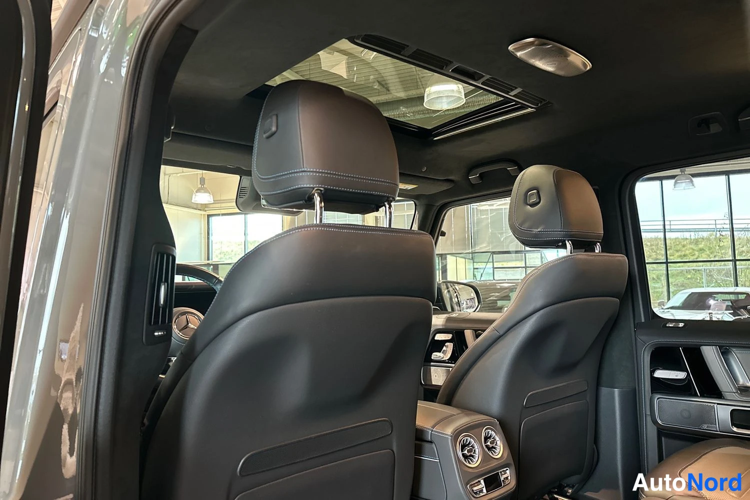 Silver Mercedes-Benz G 580 4MATIC 2025, front seats, photo 11
