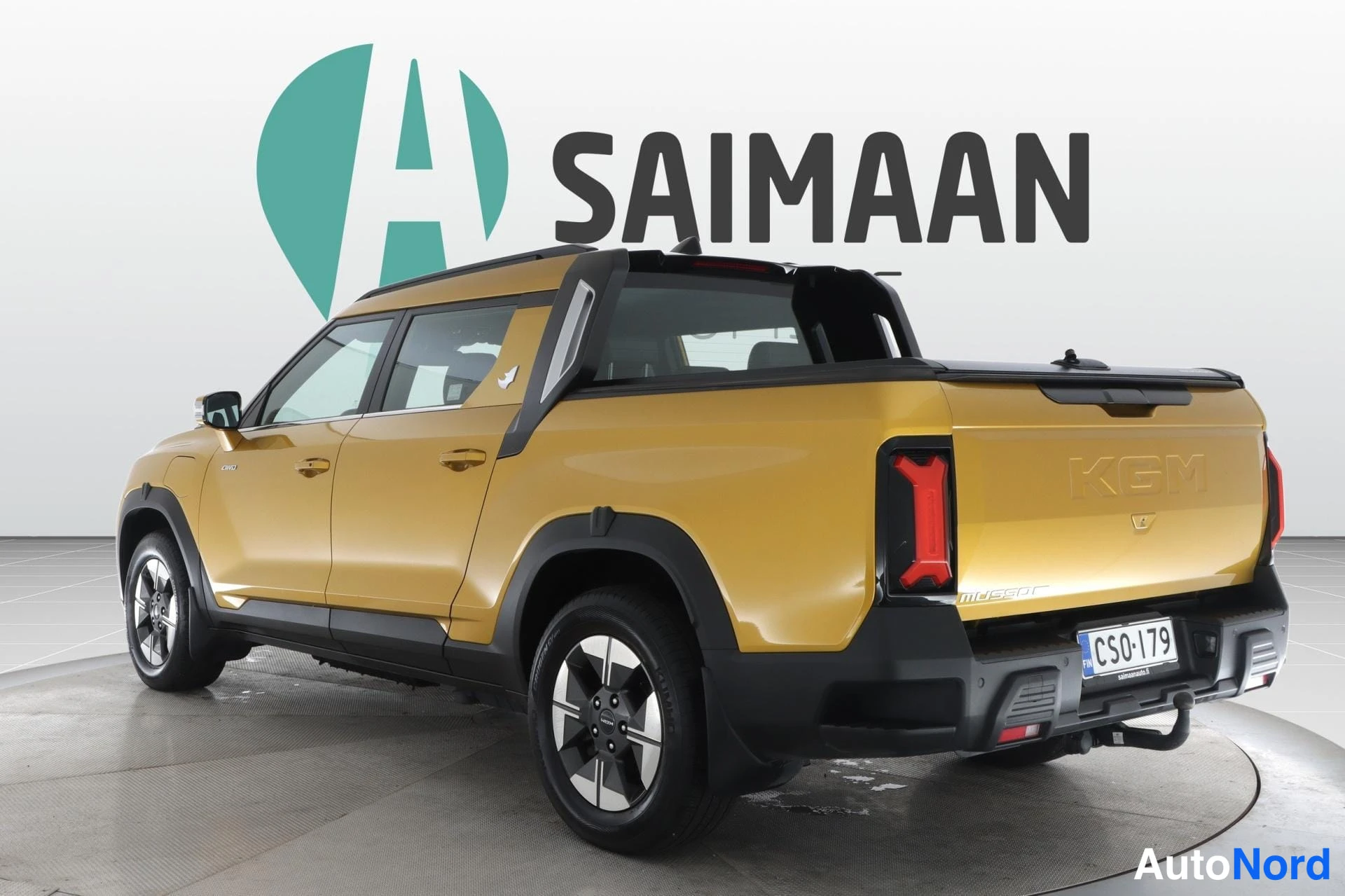 Keltainen KGM Musso EV 2025, takaviisto, kuva 9