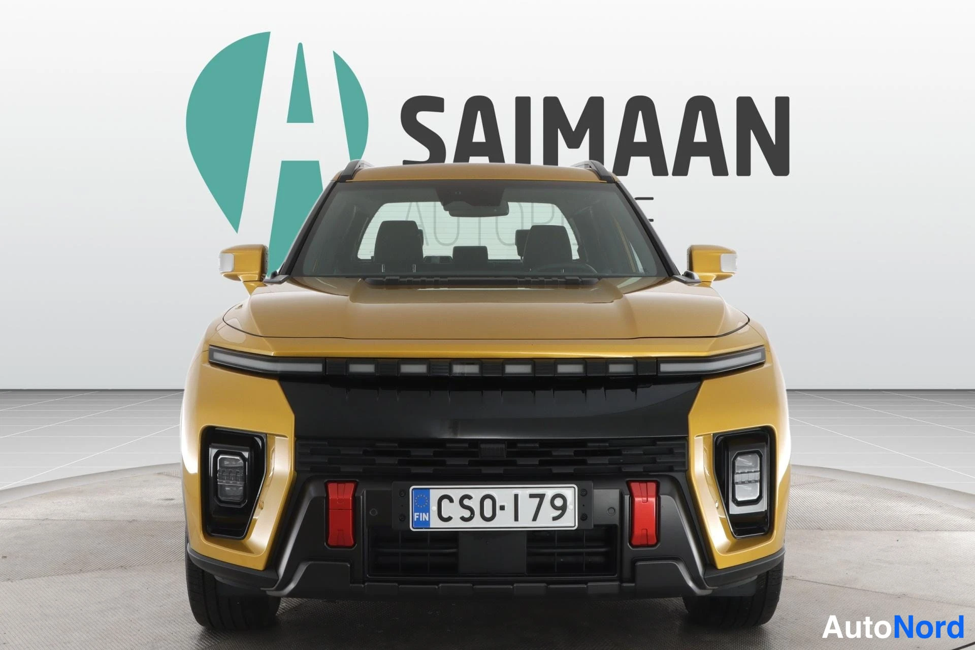Keltainen KGM Musso EV 2025, edestä, kuva 5