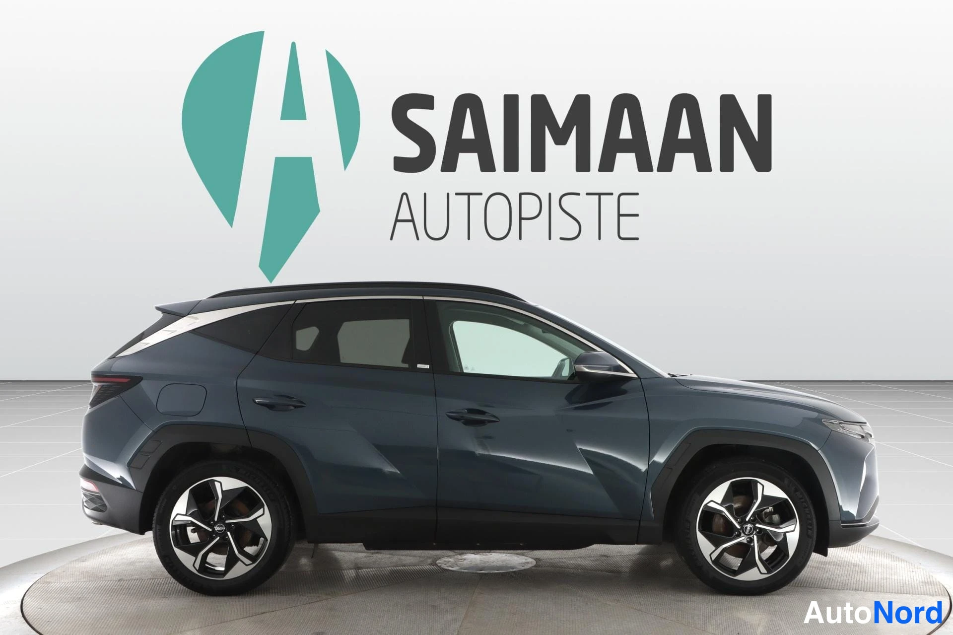 Sininen Hyundai Tucson 2021, sivulta, kuva 4