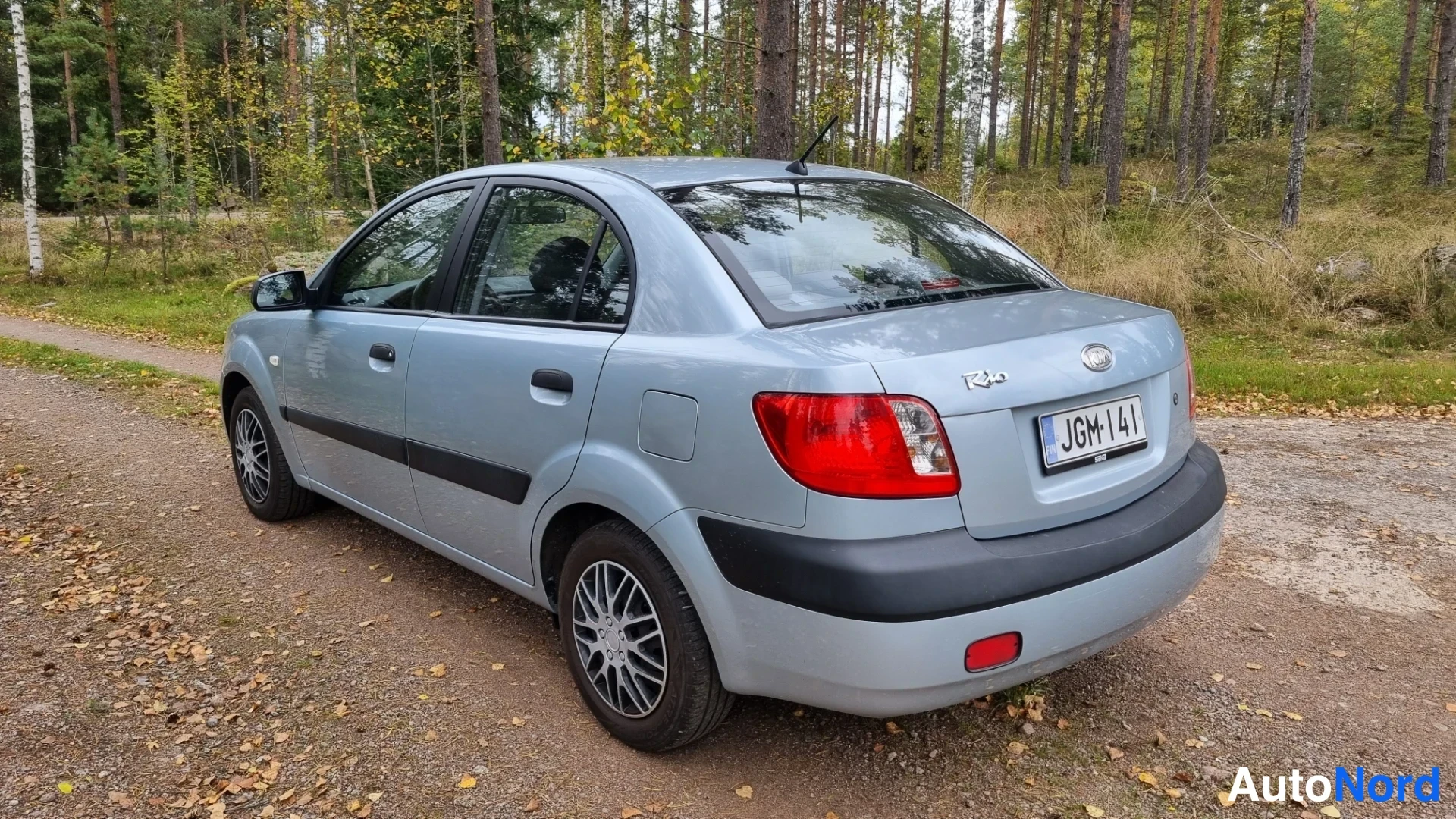 Sininen Kia Rio 2006, takaviisto, kuva 6