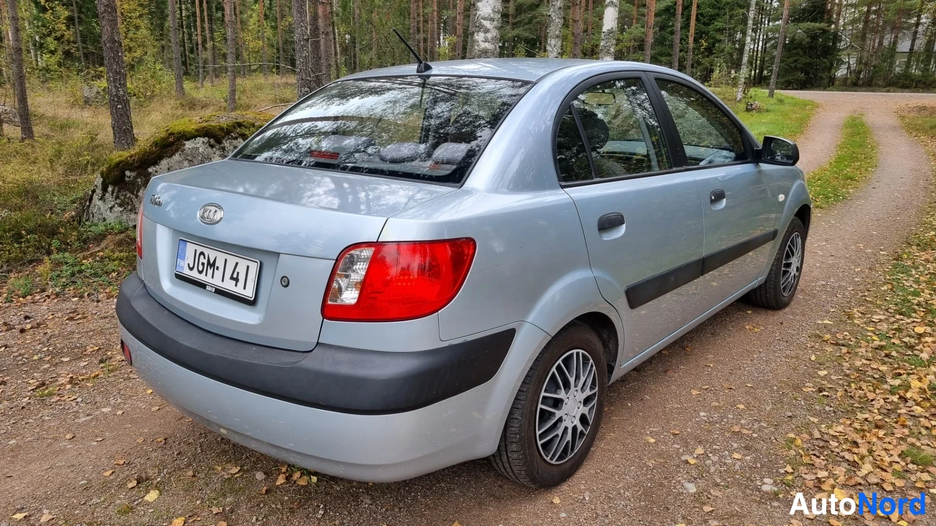 Sininen Kia Rio 2006, takaviisto, kuva 7