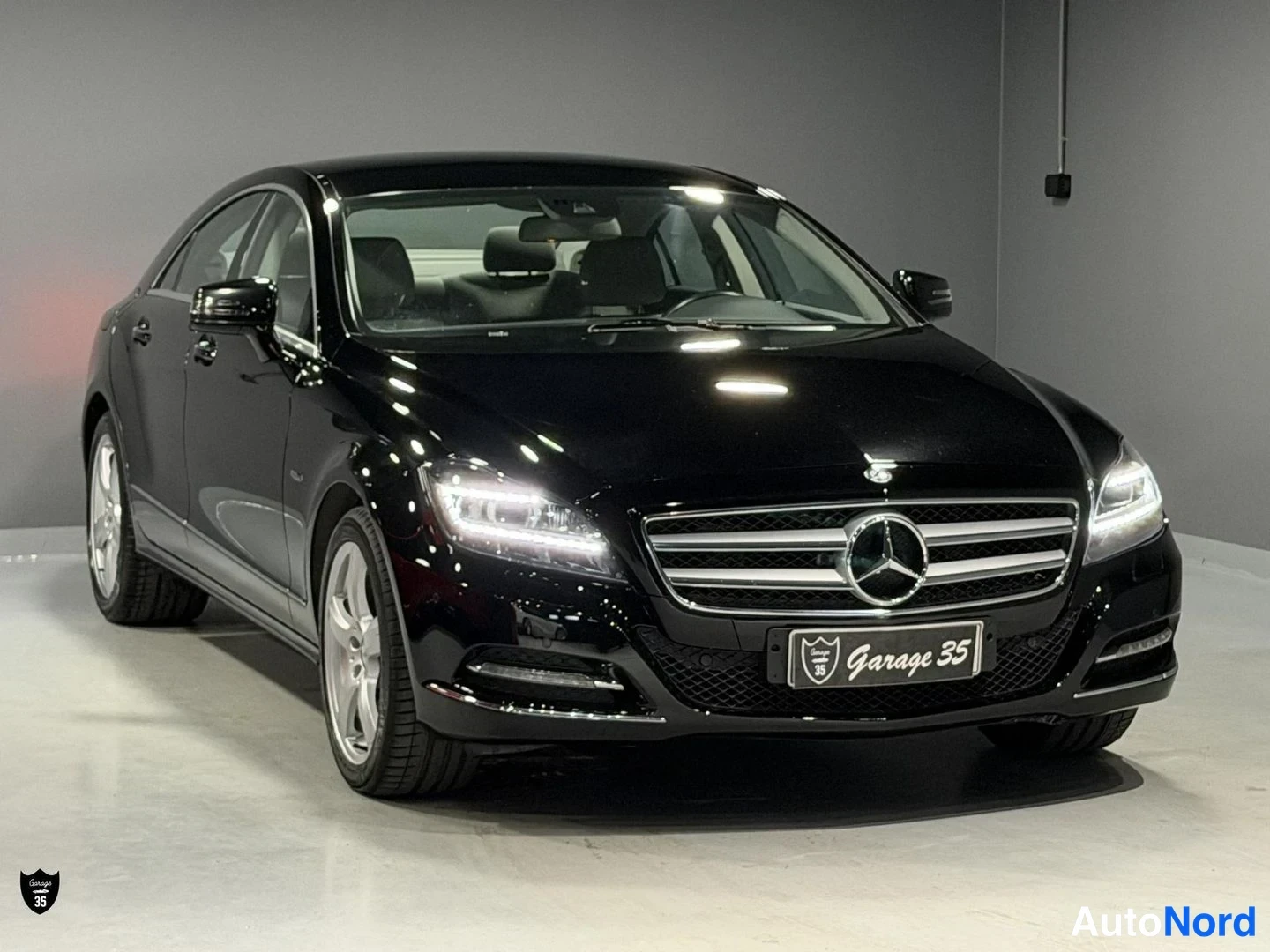 Musta Mercedes-Benz CLS 350 CDI 4MATIC 2012, etuviisto, keula oikealle, kuva 2