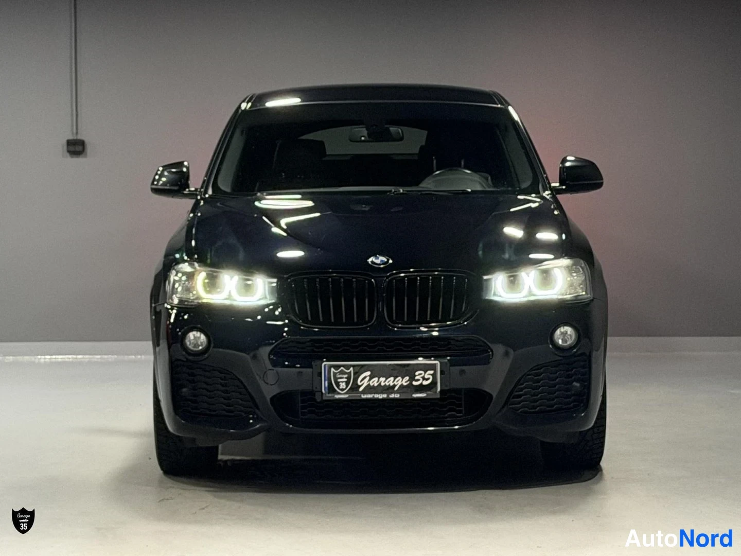 Musta BMW X4 xDrive20d 2015, edestä, kuva 4
