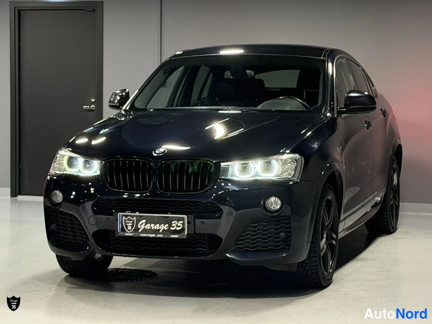 Musta BMW X4 xDrive20d 2015, etuviisto, keula vasemmalle, kuva 2