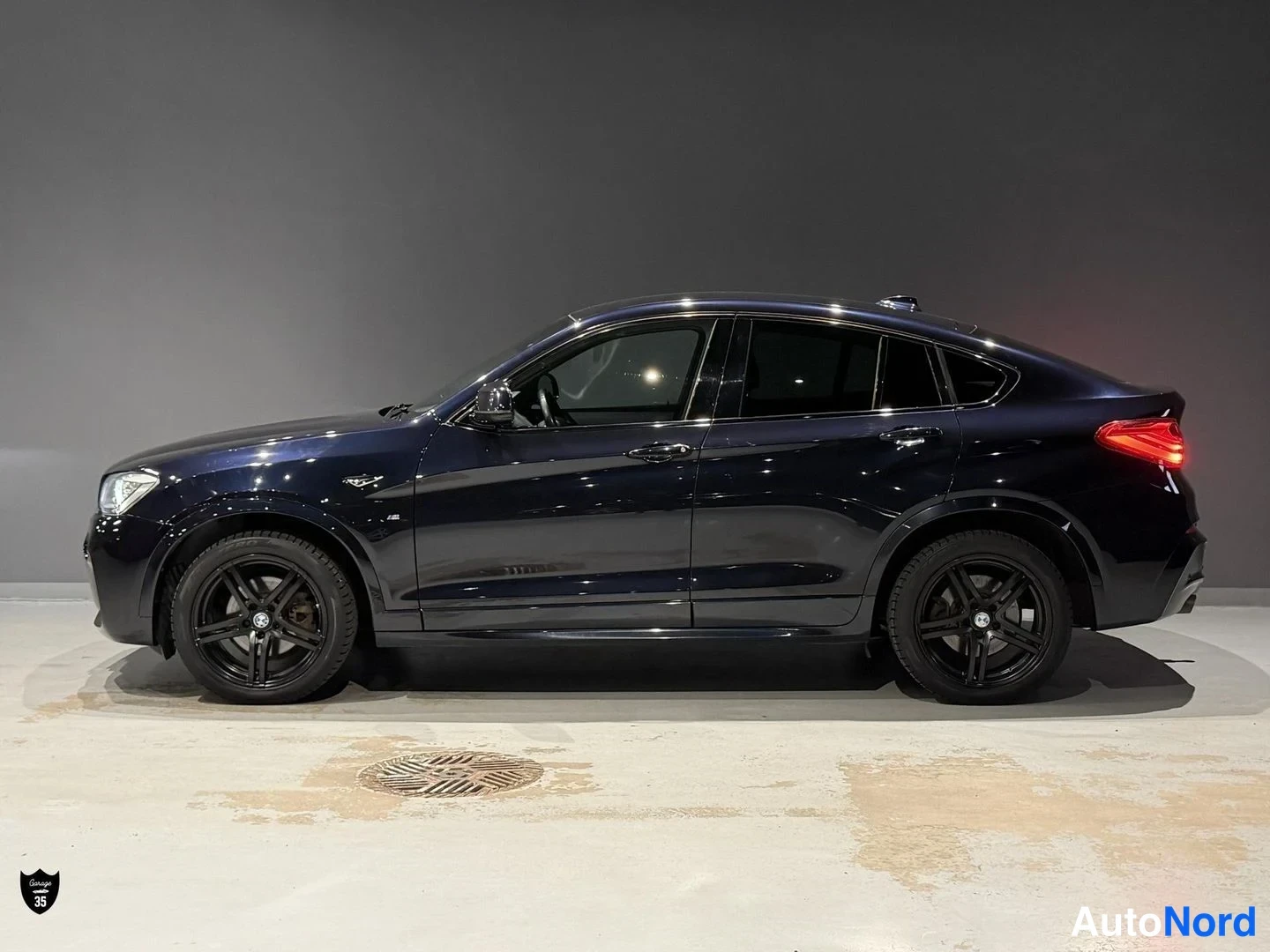 Musta BMW X4 xDrive20d 2015, sivulta, kuva 5