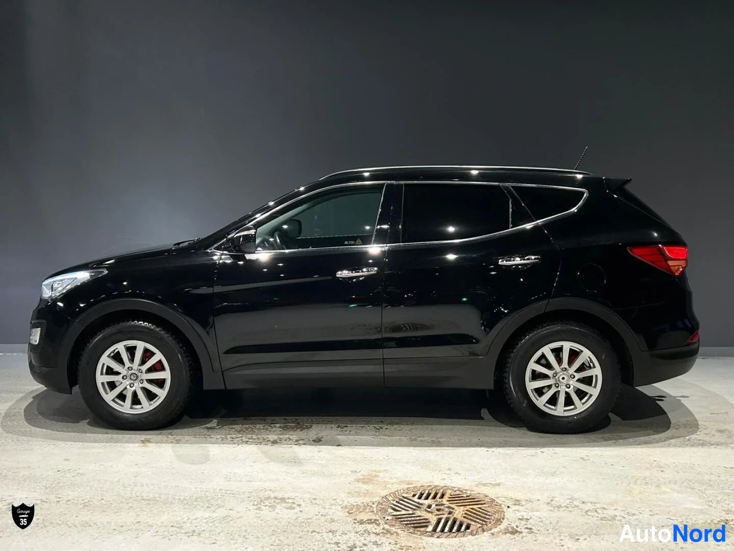 Musta Hyundai Santa Fe 2013, sivulta, kuva 6