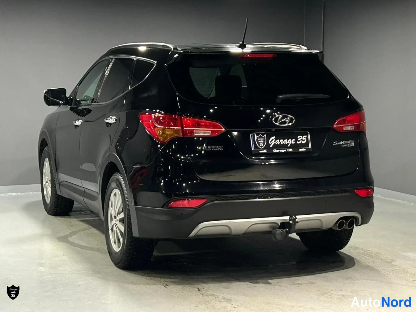 Musta Hyundai Santa Fe 2013, takaviisto, kuva 7