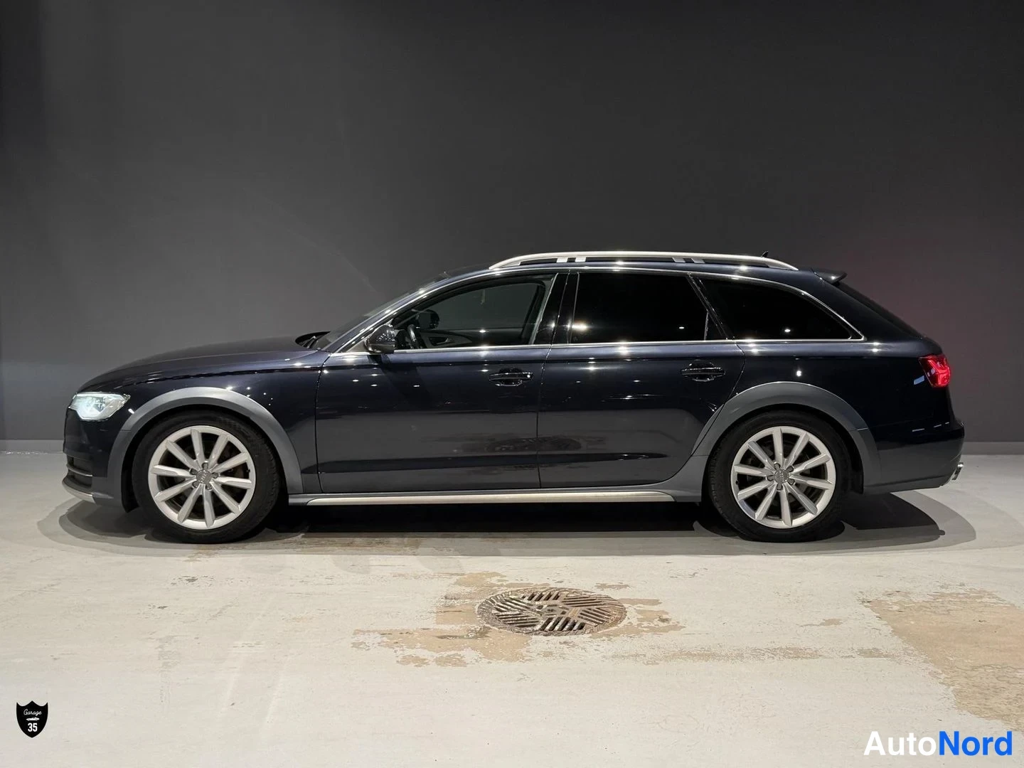 Sininen Audi A6 Allroad 2015, etuviisto, keula vasemmalle, kuva 2
