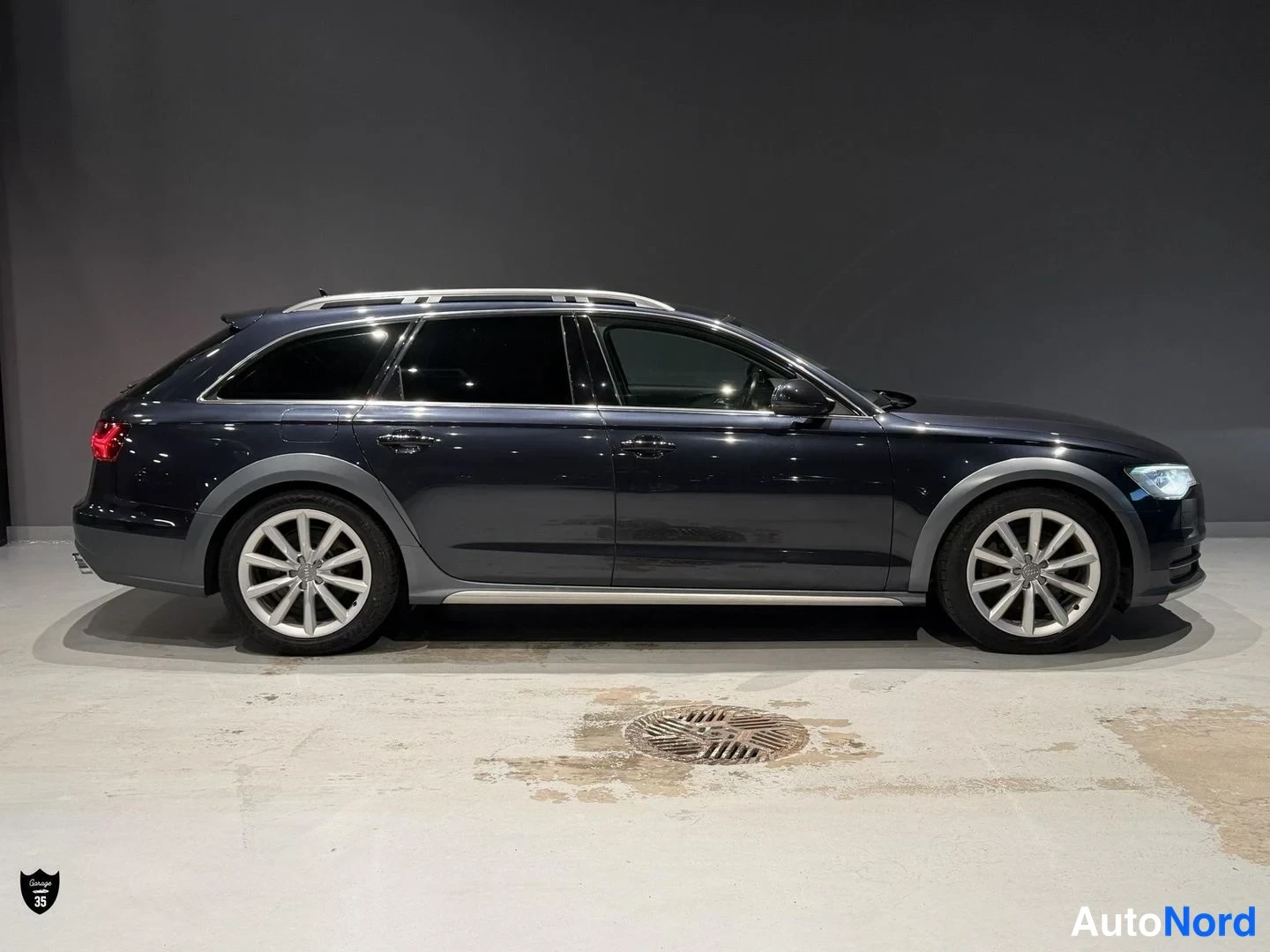 Sininen Audi A6 Allroad 2015, sivulta, kuva 6