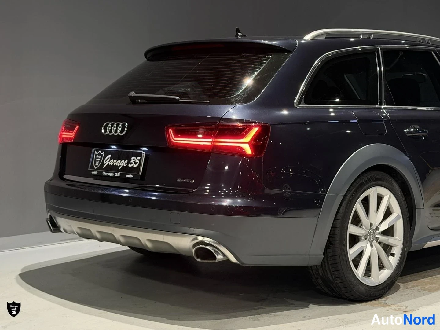 Sininen Audi A6 Allroad 2015, takaviisto, kuva 7